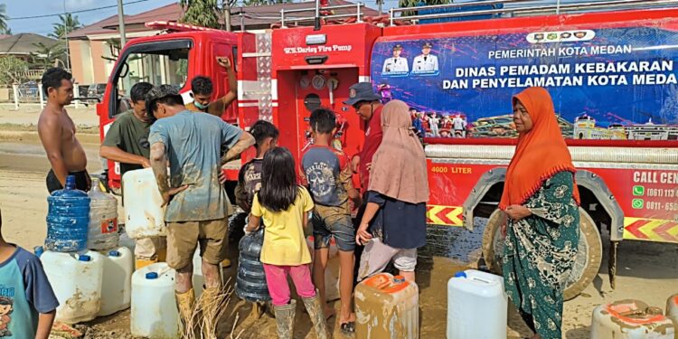 Misi Kemanusiaan Sebulan Penuh, Personel Damkarmat Kota Medan Bahu-Membahu Bersihkan Aceh Tamiang Pascabanjir