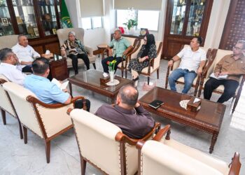 Pj Sekdaprov Sumut Terima Laporan Kinerja Komisi Informasi Tahun 2025